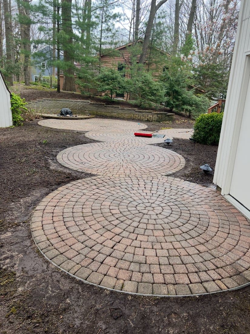 Paver walkway restoration after pressure washing by Jack's PowerWashing