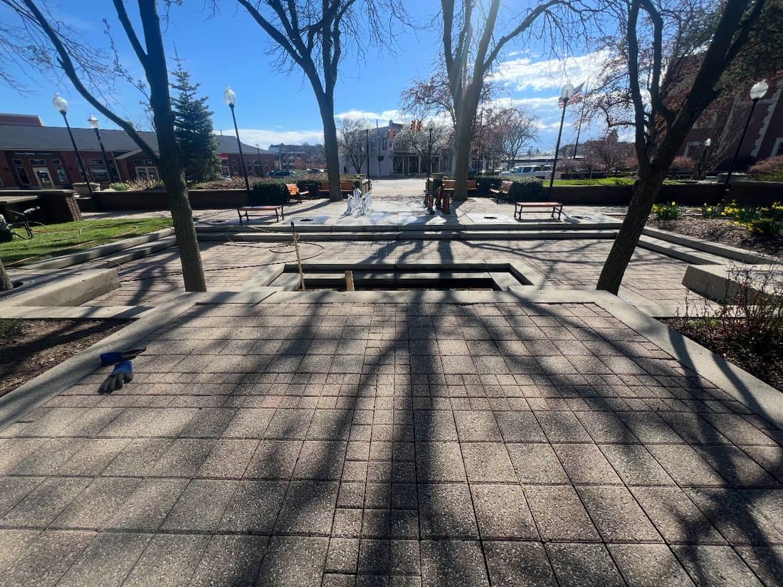 Brick plaza cleaning after pressure washing by Jack's PowerWashing