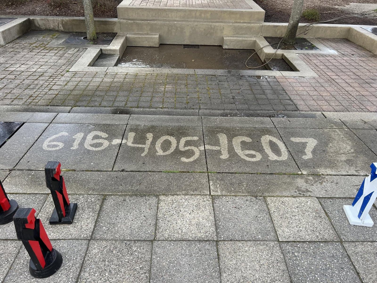 Concrete cleaned to bare surface by Jack's PowerWashing near Holland, Michigan